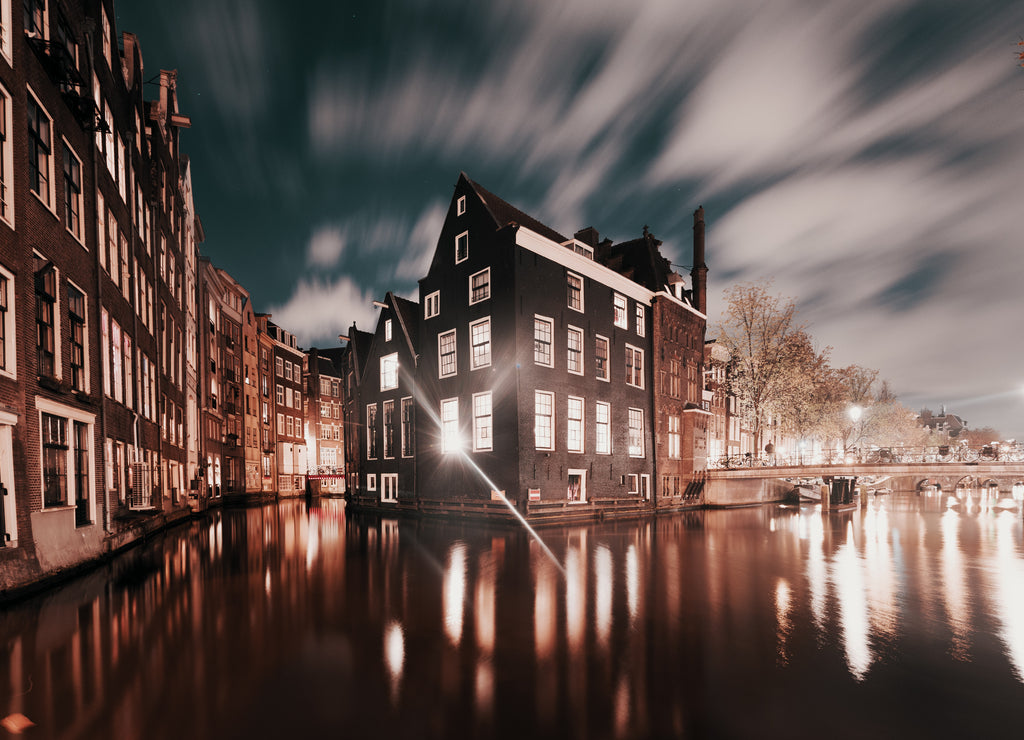 Amsterdam, canals and buildings at dusk, Netherlands