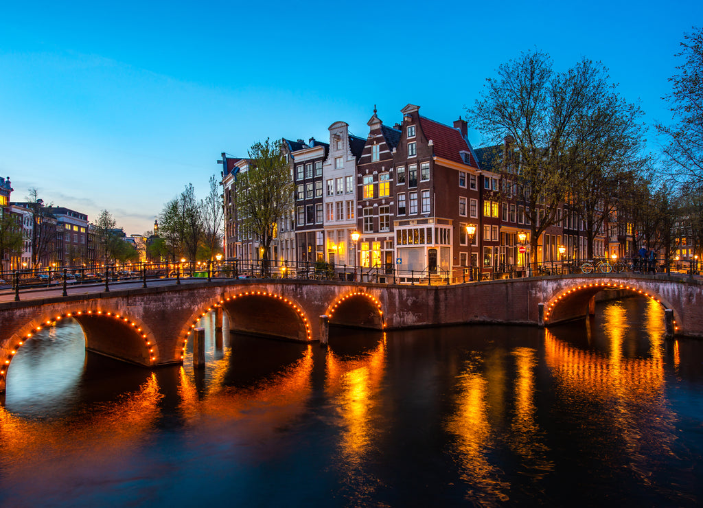 Canals of Amsterdam at night. Amsterdam is the capital and most populous city of the Netherlands