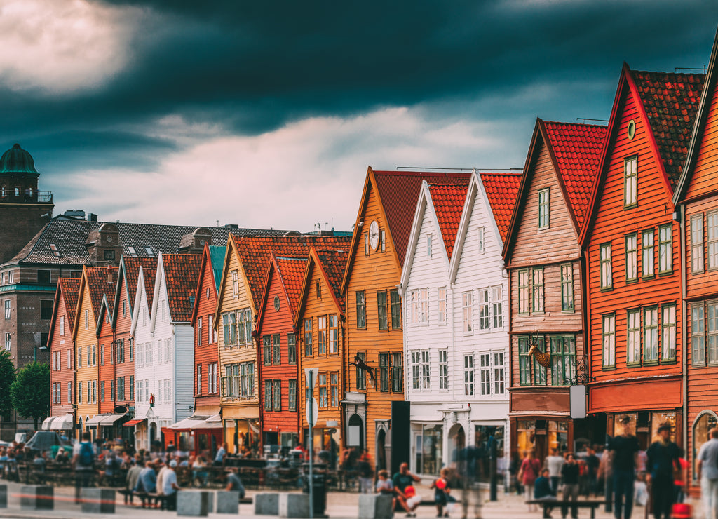Bergen, Norway. Tourists People Visiting Historical Landmark Houses In Bryggen - Hanseatic Wharf In Bergen, Norway. UNESCO World Heritage Site
