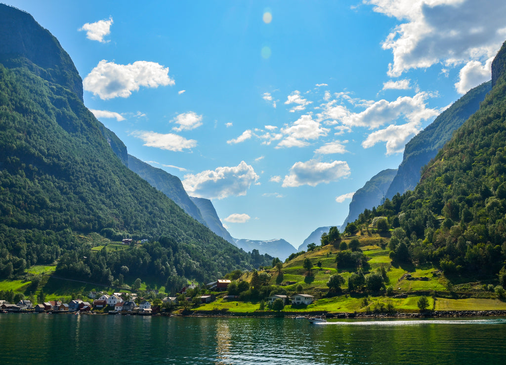 Beautiful Fishing village Undredal close the fjord near the beautiful mountains on coast of majestic landscape with calm water at Aurlandsfjord (Aurlandsfjorden) in Flam, Norway