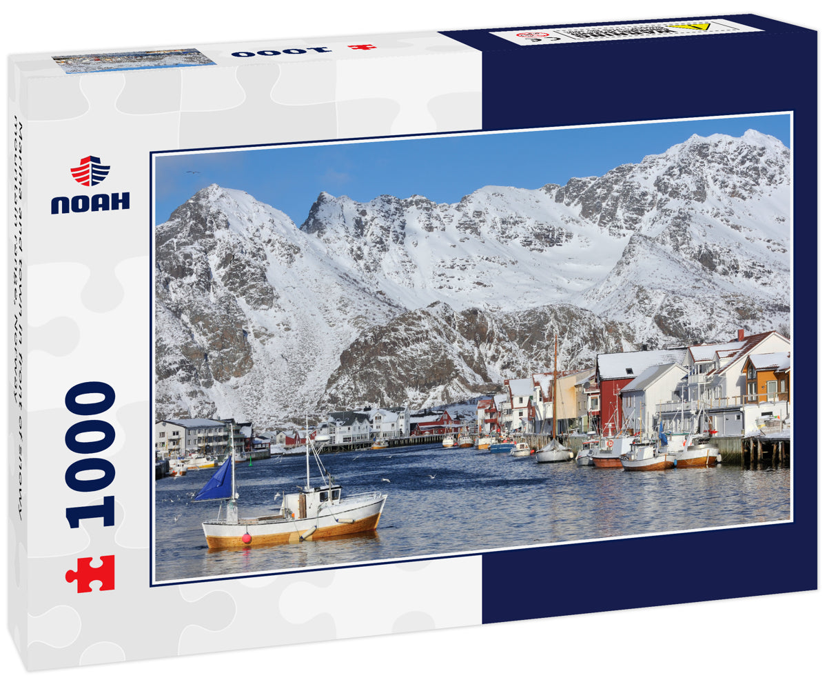 Marina and town in front of snowy mountain range, Norway