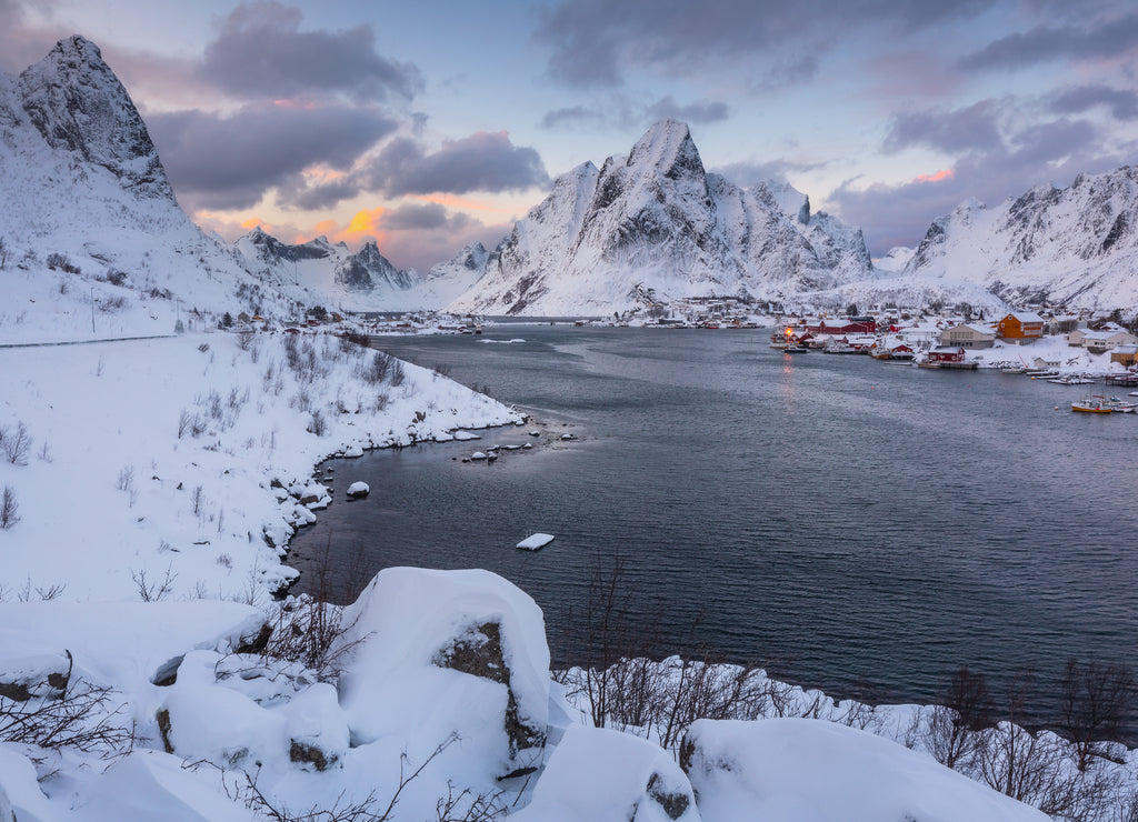 View of amazing Lofoten Islands winter scenery with mountains and fiords in beautiful golden morning light at sunrise, Norway