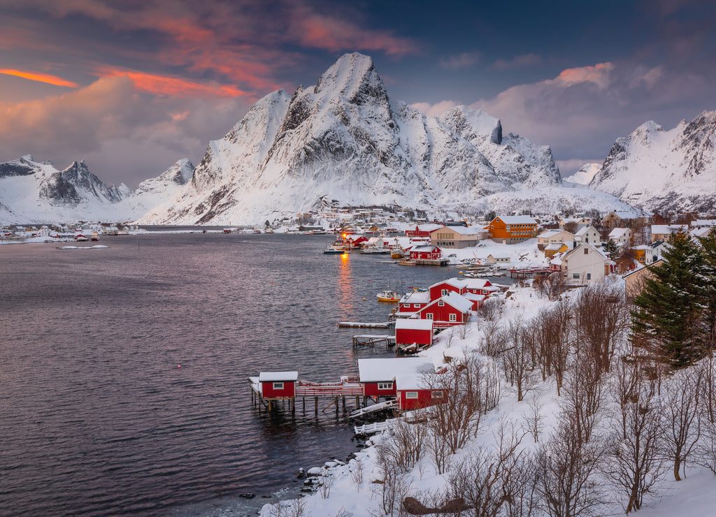 View of amazing Lofoten Islands winter scenery with mountains and fiords in beautiful golden morning light at sunrise, Norway