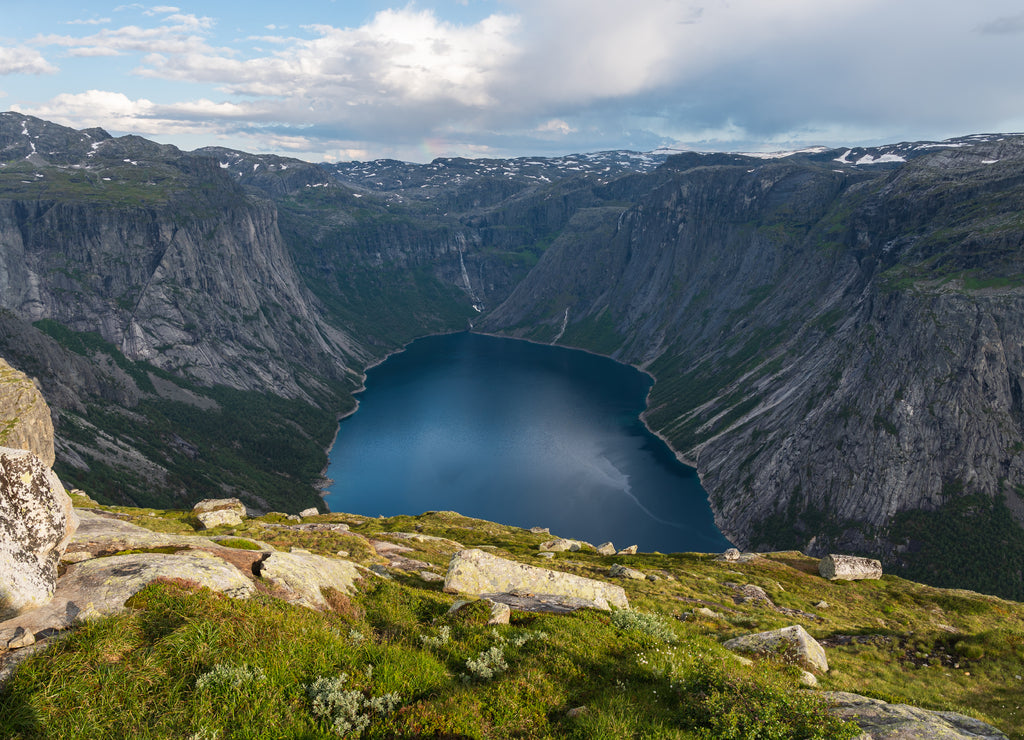 Beautiful mountains and lake a long the way to Trolltunga cliff in Odda, Norway, Scandinavia