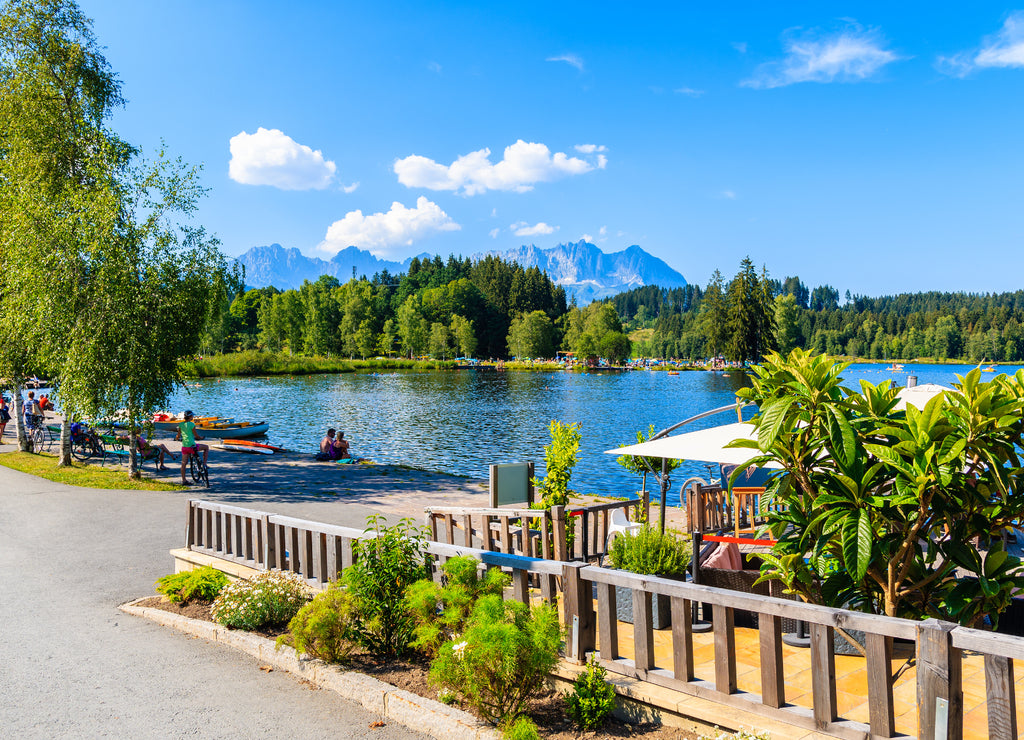 Shore of Schwarzsee lake on sunny beautiful summer day near Kitzbuhel, Tyrol, Austria