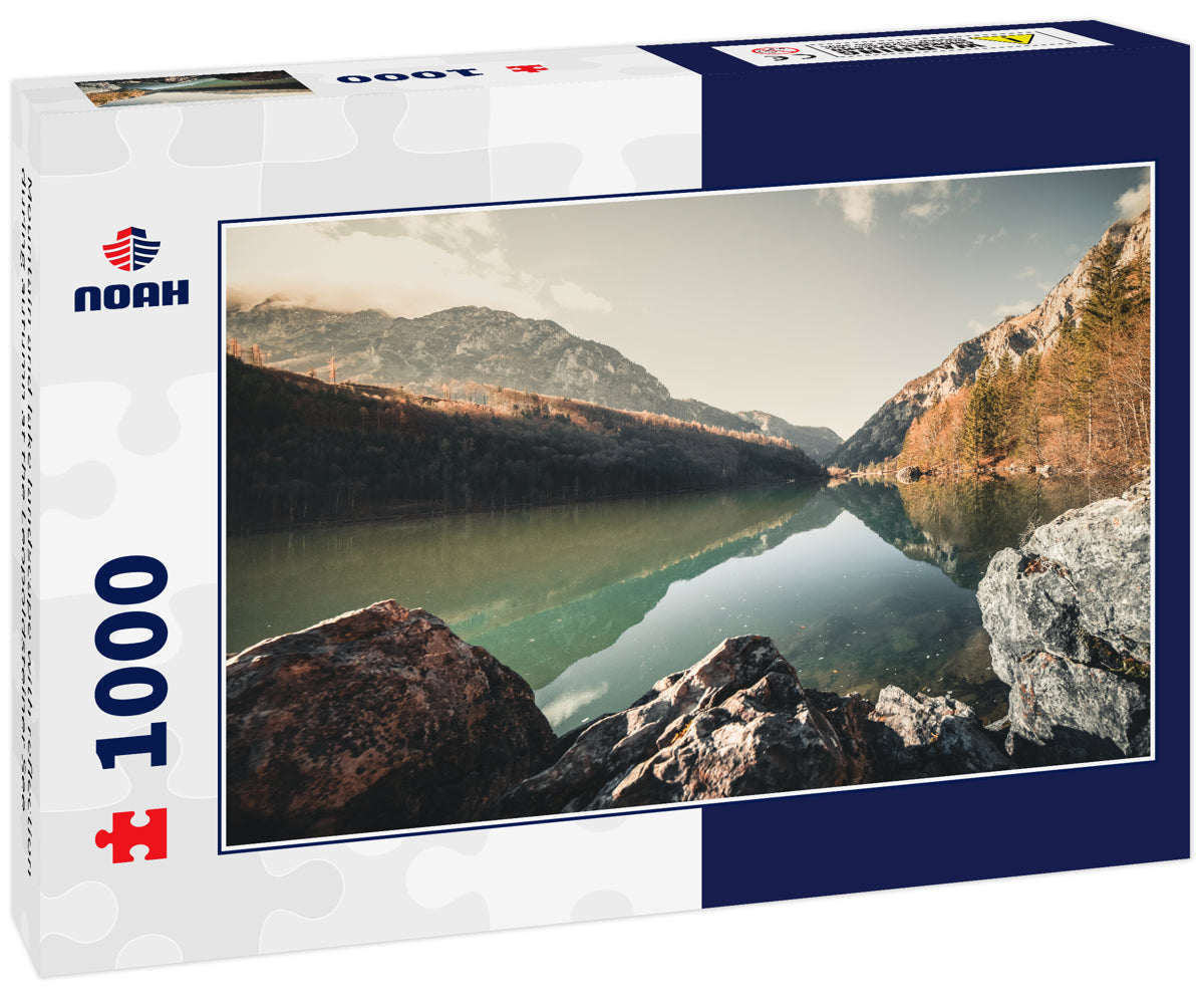 Mountain and lake landscape with reflection during autumn at the Leopoldsteiner See