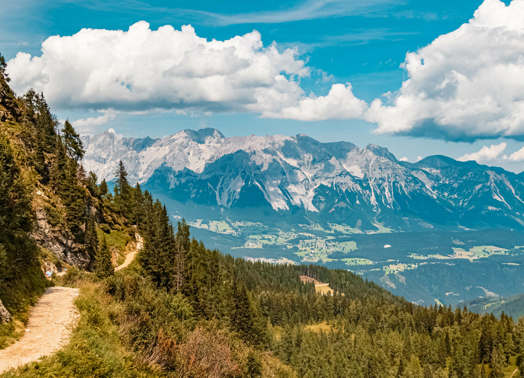 Beautiful alpine summer view with reflections and the famous Dachstein mountains in the background at the Reiteralm, Pichl, Schladming, Steiermark, Austria