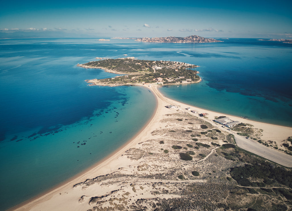 Aerial view of Isuledda (Isola dei Gabbiani) and Porto Pollo Beach, Palau, heaven of wind and kite surfers