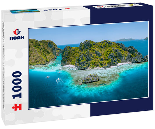 Aerial drone view of tropical Shimizu Island steep rocks and white sand beach in blue water El Nido, Palawan, Philippines