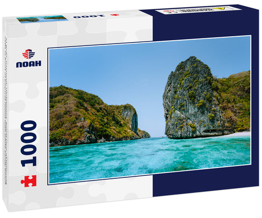 El Nido, Palawan, Philippines. Aerial view of towering cliffs in front of tropical Island with white sandy beach