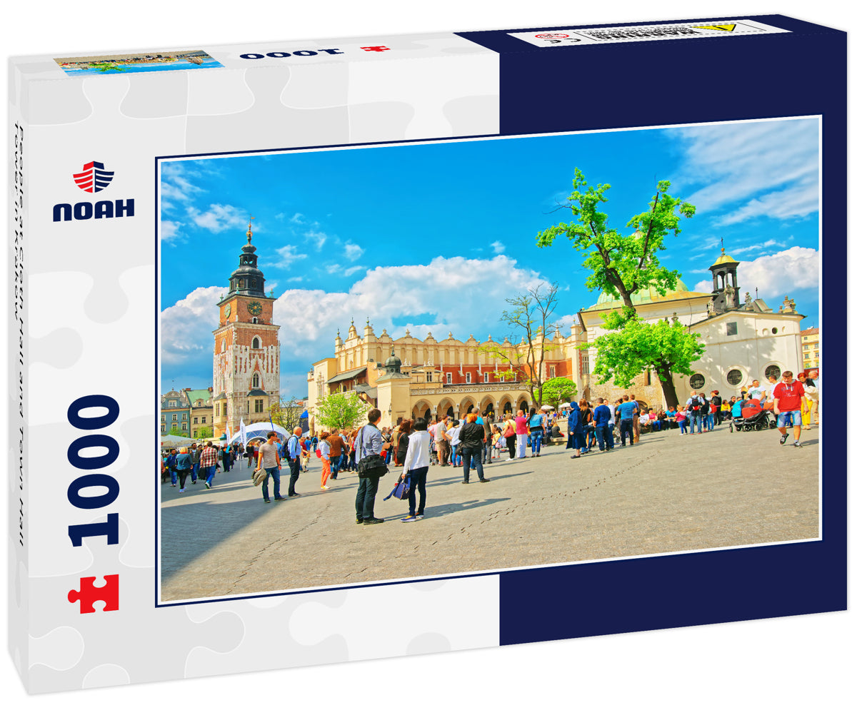 People at Cloth Hall and Town Hall Tower in Krakow