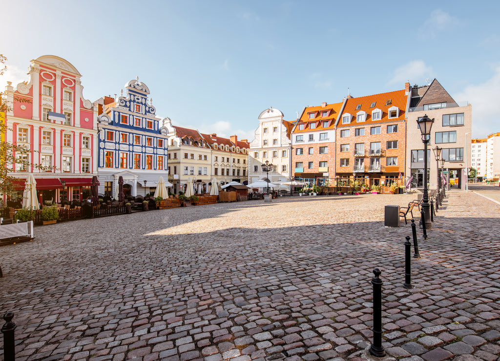 View on the Market square with beautiful colorful buildings during the morning light in Szczecin city, Poland