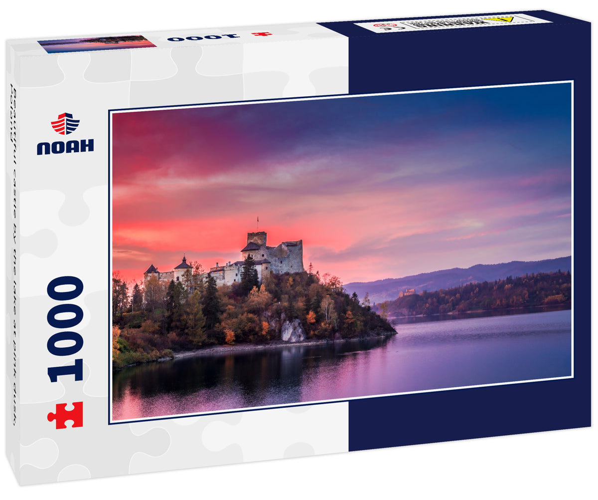 Beautiful castle by the lake at pink dusk, Poland