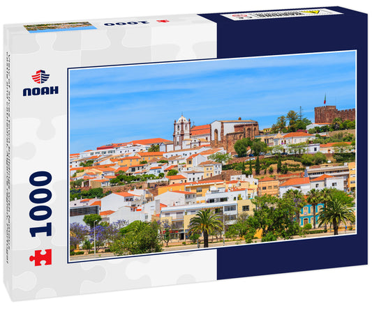 View of Silves town buildings with famous castle and cathedral, Algarve region, Portugal