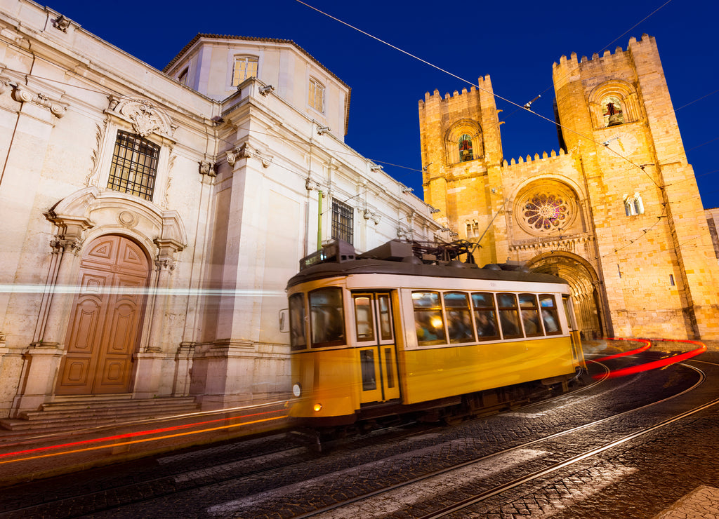 Tram in front of the Lisbon Cathedral at night