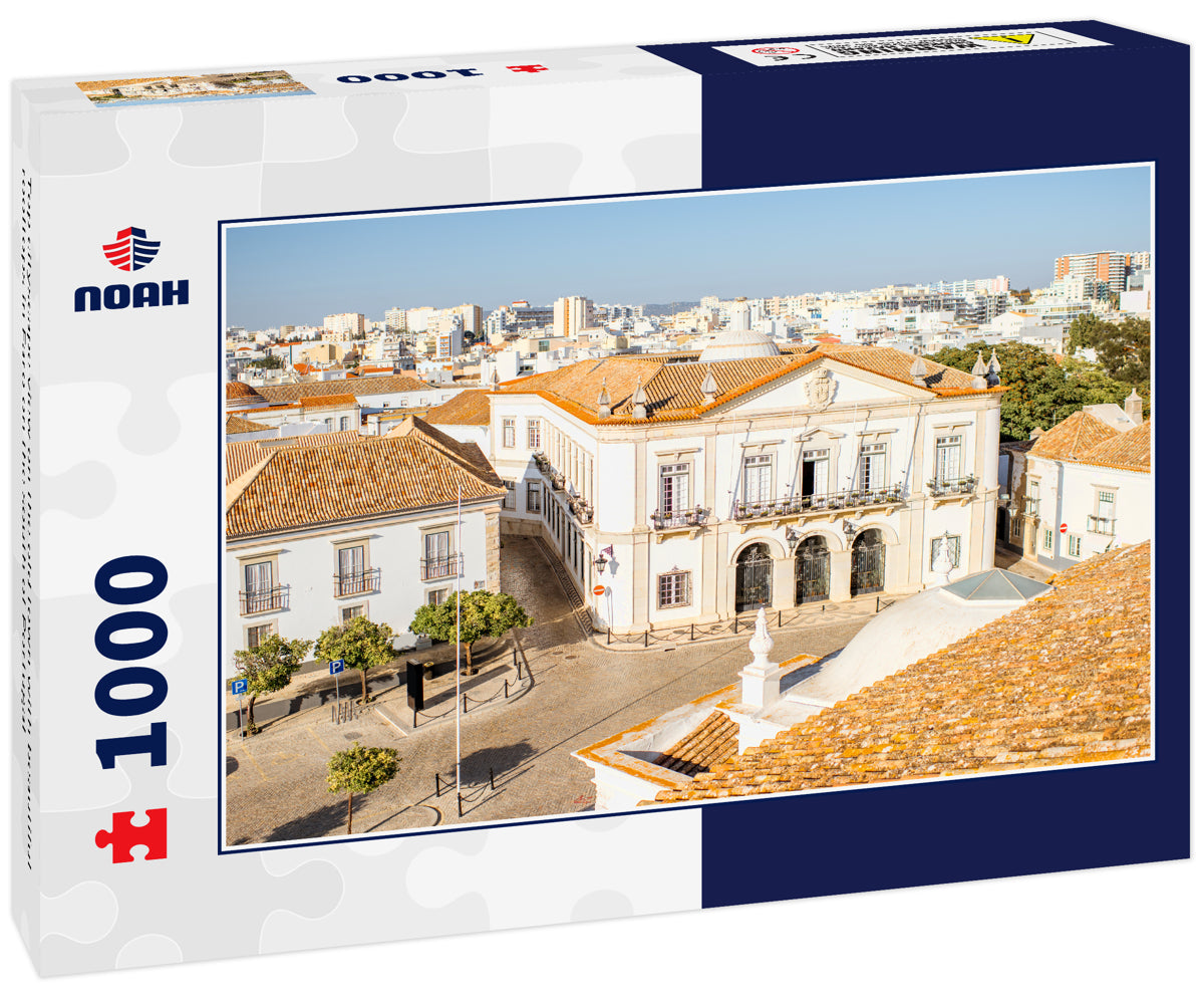Top cityscape view on the old town with beautiful rooftops in Faro on the south of Portugal