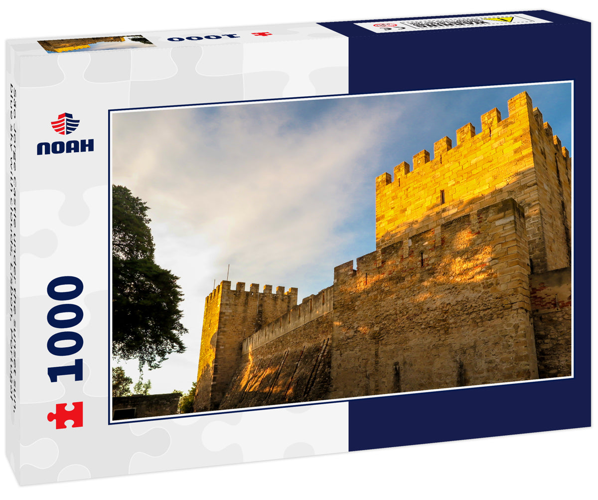 São Jorge Castle under the sunset sun, blue sky with clouds, Lisbon, Portugal