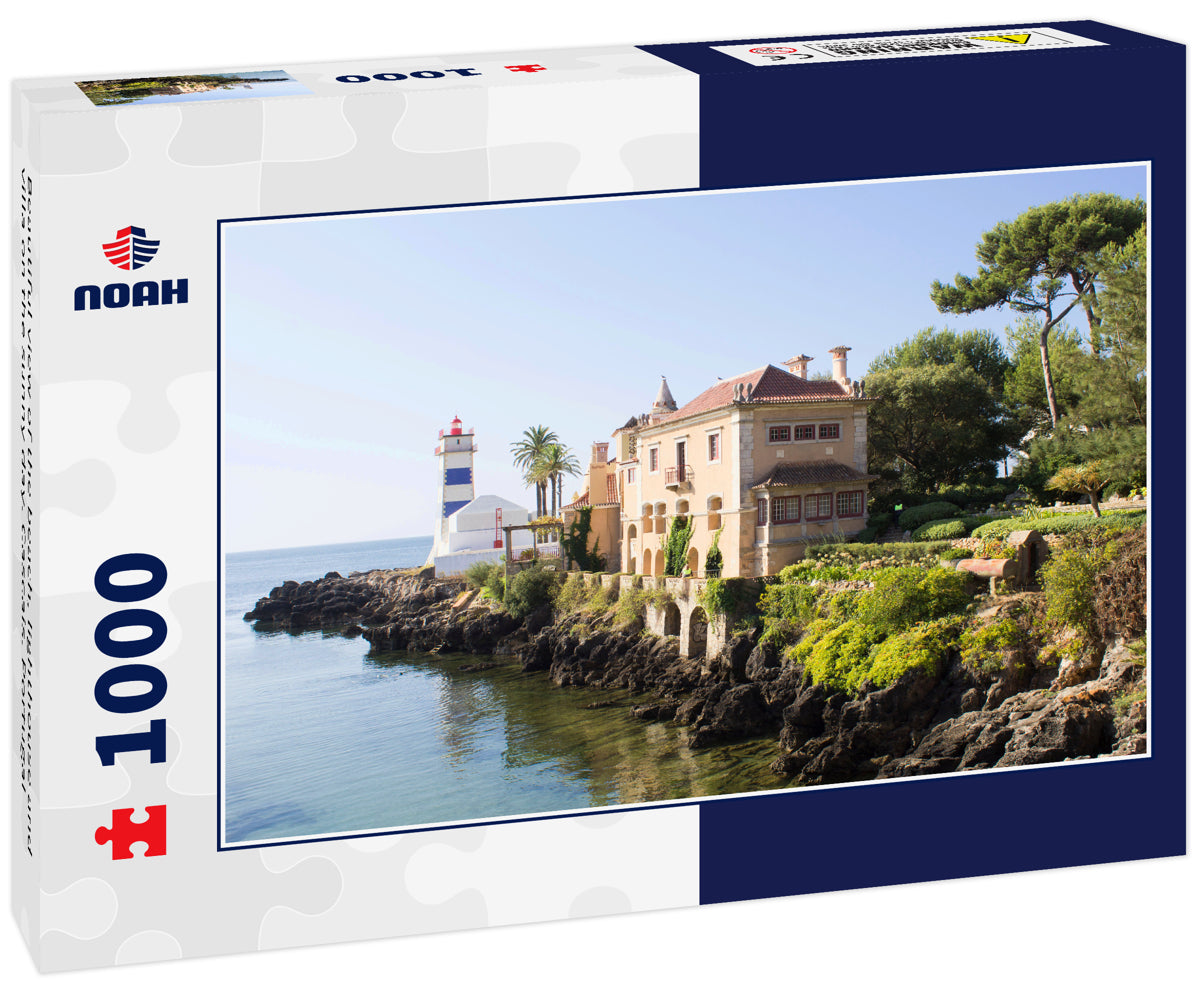 Beautiful view of the beach, lighthouse and villa on the sunny day. Cascais. Portugal