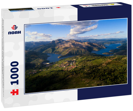 Aerial panoramic view of the historic village of Lindoso, with the surroundings mountains and lake, at the Peneda Geres National Park, in Portugal