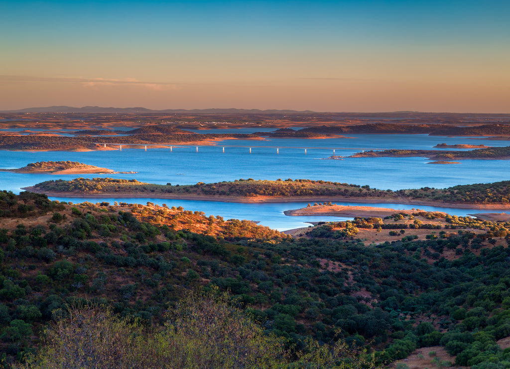 Portugal, Monsaraz. View from the fortress walls to Guadiana river at sunset