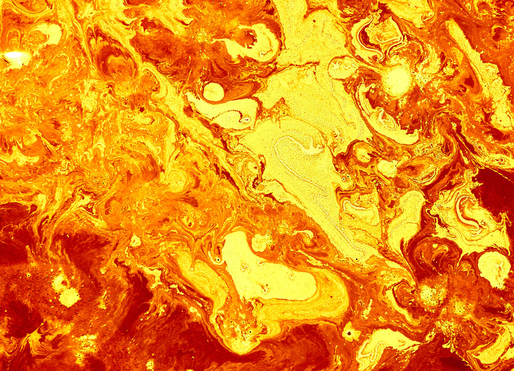 Abstract golden orange background. Flashes in the sun, liquid fire. Flowing lava colors paint