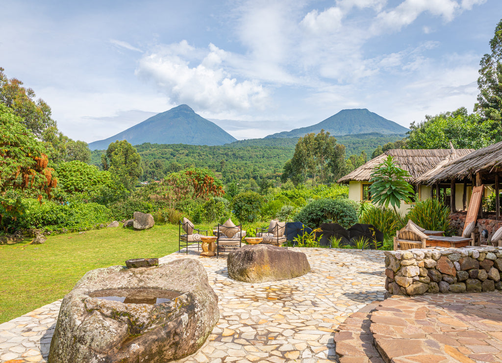 View of mount Sabyinyo and mount Gahinga, two of the volcanoes in the Volcanoes National Park in Rwanda. Picture shot standing in Uganda
