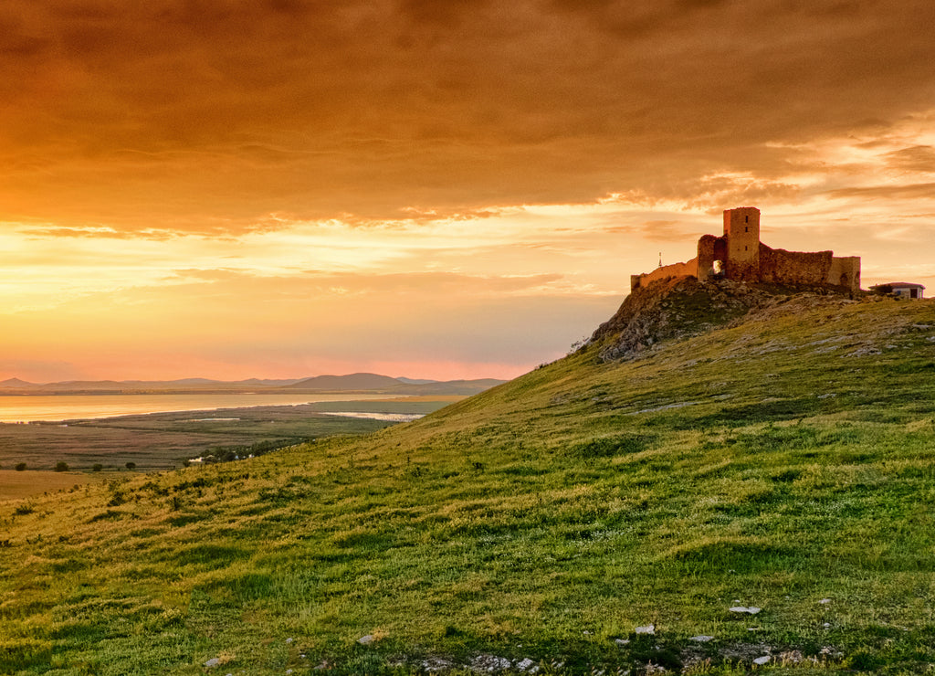 Romania sunset in Dobrogea at the Enisala Fortress. Important historical landmark near Tulcea and Constanta