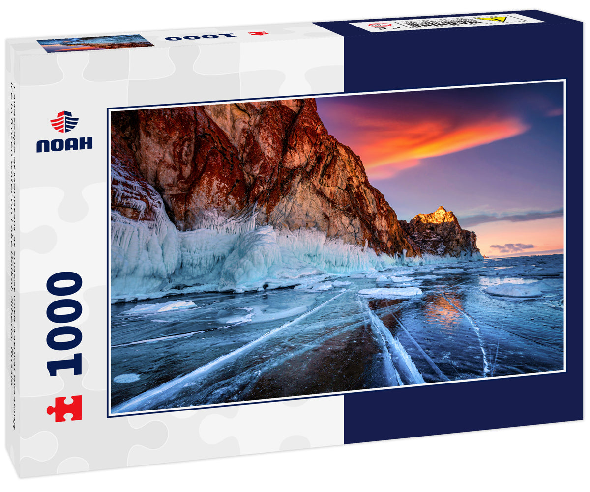 Landscape of Mountain at sunset with natural breaking ice in frozen water on Lake Baikal, Siberia, Russia