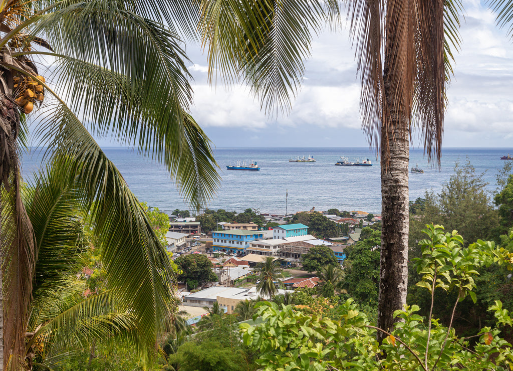 View of ships in Iron Bottom Sound, over Chinatown and Kukum Highway in Honiara, Solomon Islands