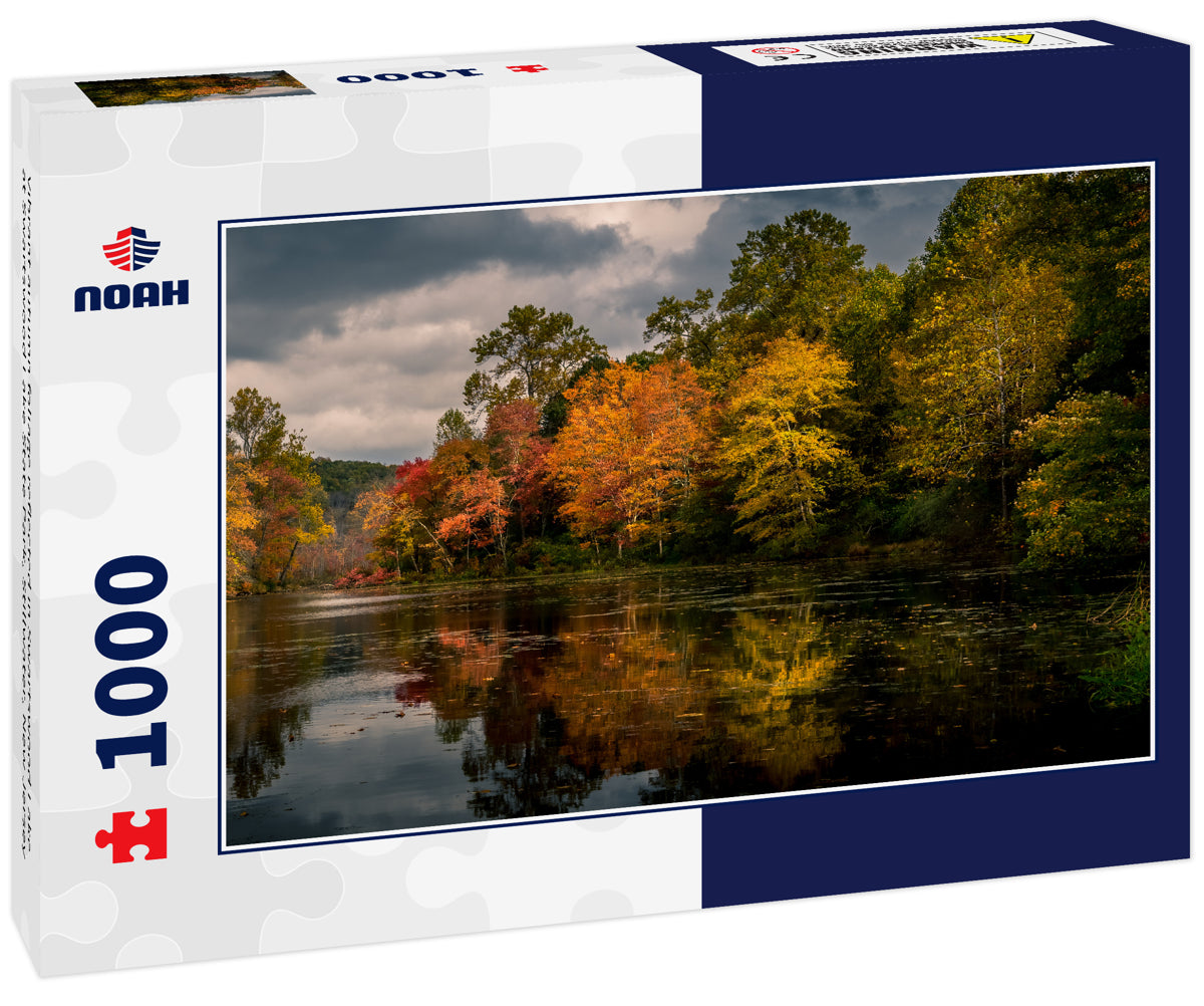 Vibrant autumn foliage reflected in Swartswood Lake at Swartswood Lake State Park, Stillwater, New Jersey