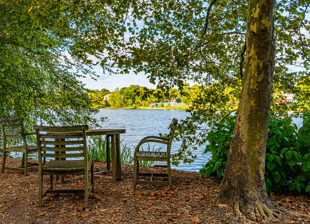 landscape with lake, table and chairs in sculpture garden New Jersey, US