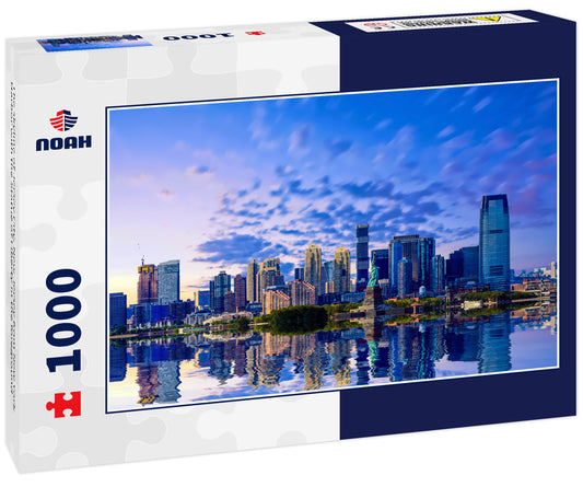 The skyline of Jersey City, New Jersey from New York Harbor with the Statue of Liberty in the foreground