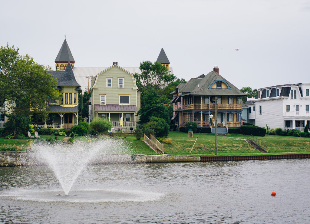 Fountain and houses along Wesley Lake, in Asbury Park, New Jersey