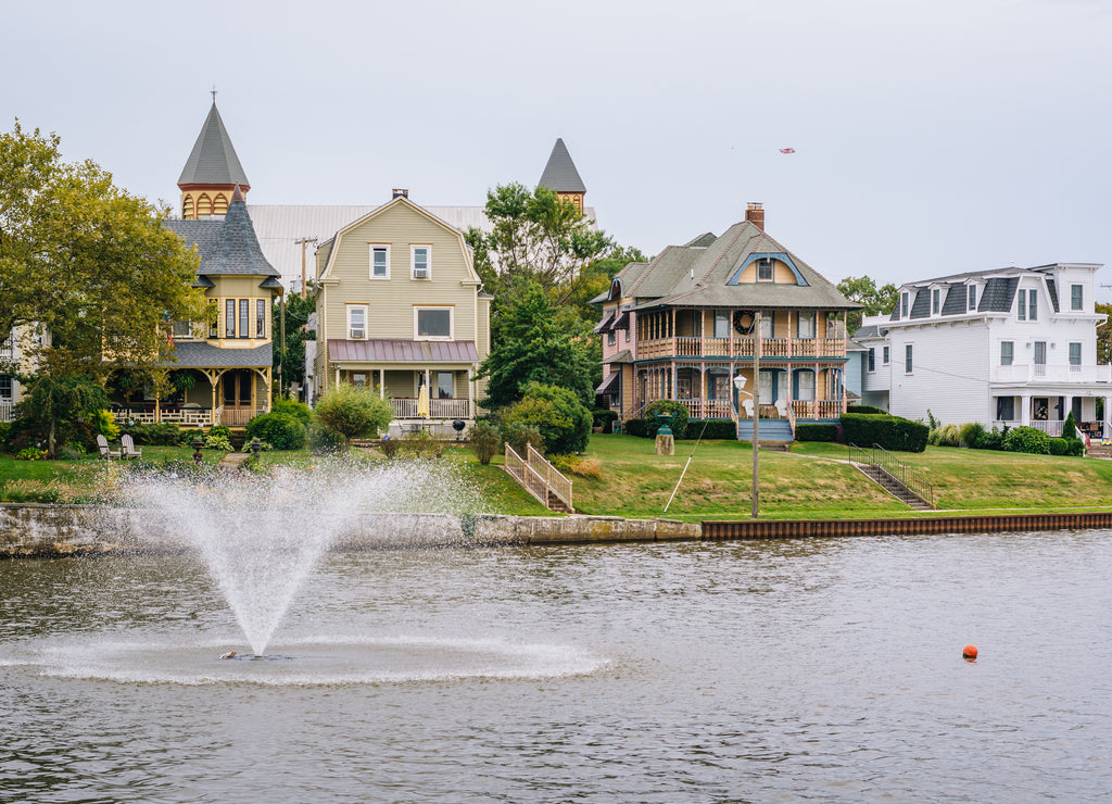 Fountain and houses along Wesley Lake, in Asbury Park, New Jersey