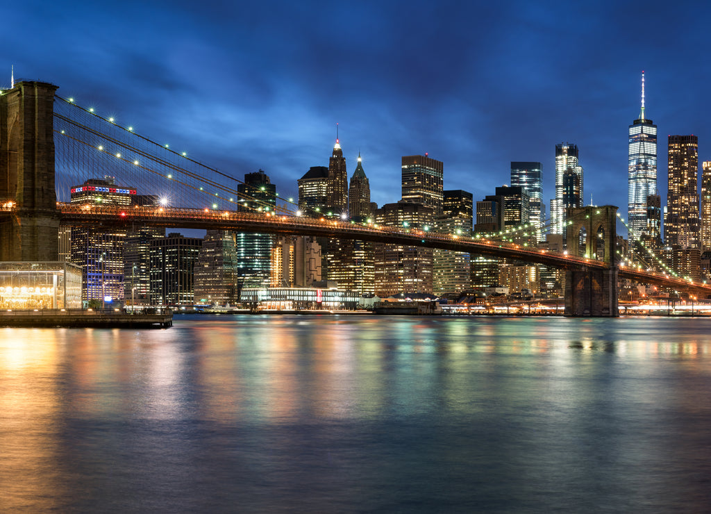 Brooklyn Bridge panorama at night, New York City, USA