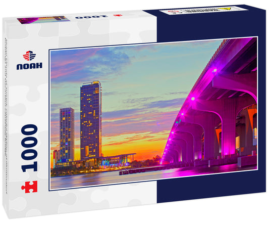 Miami Florida at sunset, colorful skyline of illuminated buildings and Macarthur causeway bridge