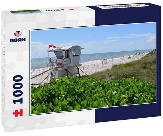 Beach with lifeguard stand, sunny day in Vero Beach, Florida