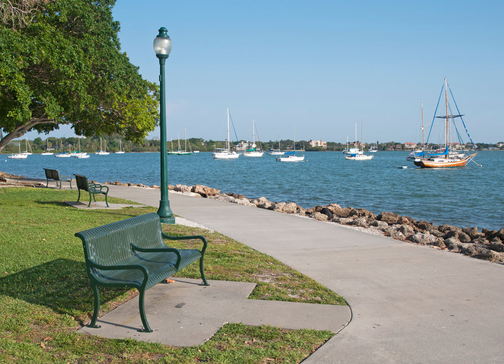 Green metal benches at the Sarasota Marina, Sarasota, Florida