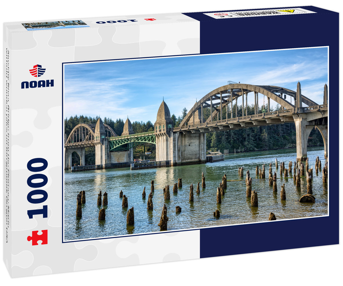 Siuslaw River Bridge from the Florence Marin withold wooden piles on foreground, Oregon USA