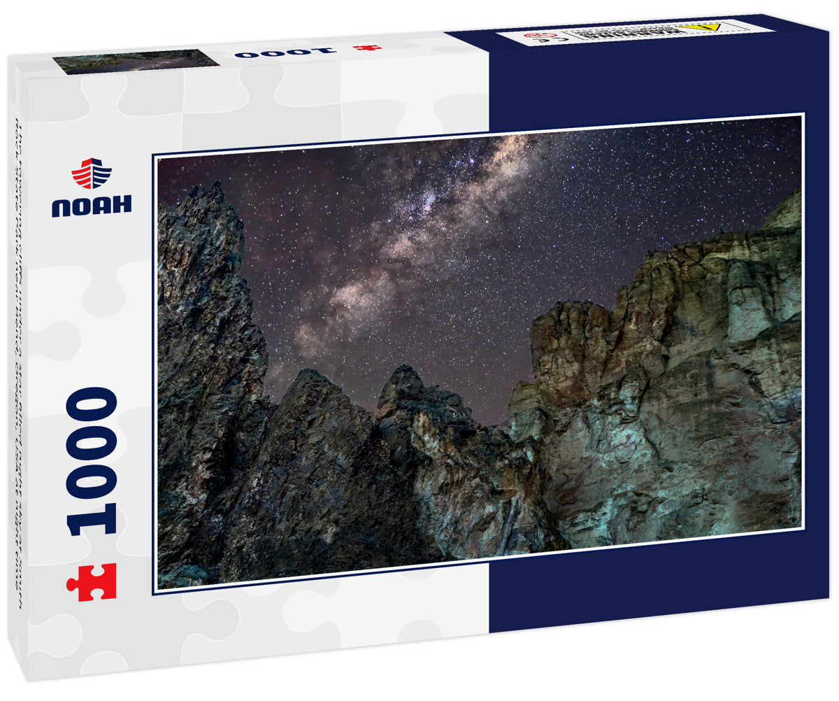 The towering cliffs under a star filled night sky at Smith Rock State Park near Bend, Oregon, USA at night time