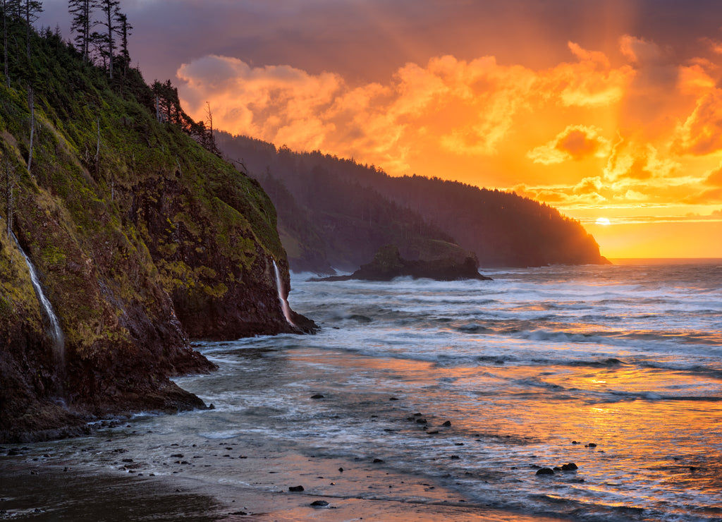 The sun sets over the Pacific at Cape Lookout State Park, Oregon