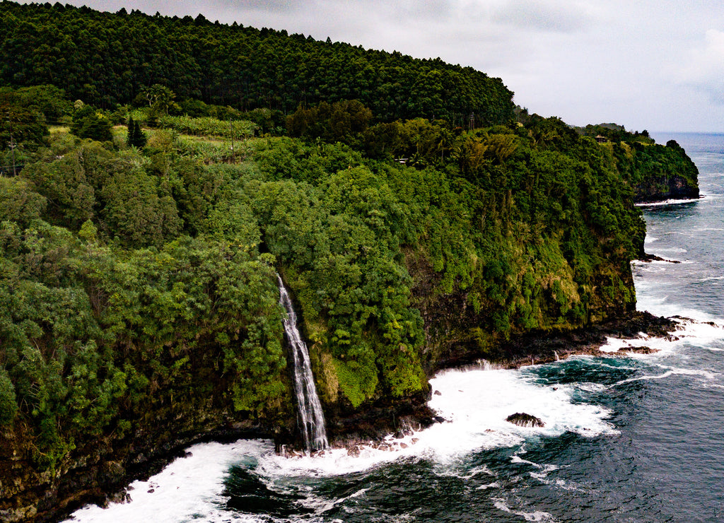 Hidden Waterfall near Hilo Big Island Hawaii – Lush green Big Island Hawai’I drone video of a hidden waterfall on a riny afternoon before the volcano erupted