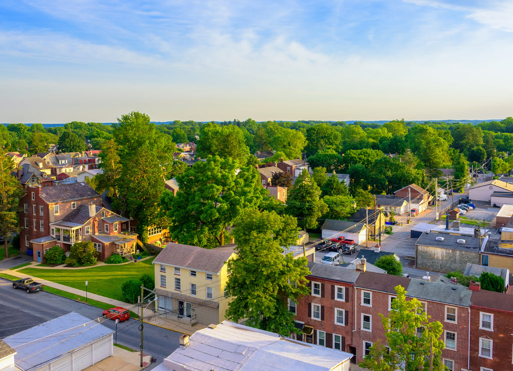 Aerial view of suburban houses and sunset sky - West Chester, Pennsylvania, USA