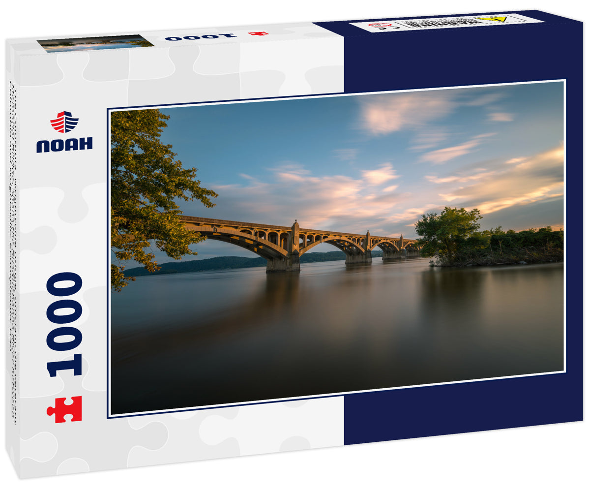 The Columbia–Wrightsville Bridge, officially the Veterans Memorial Bridge, spans the Susquehanna River between Columbia and Wrightsville, Pennsylvania, USA