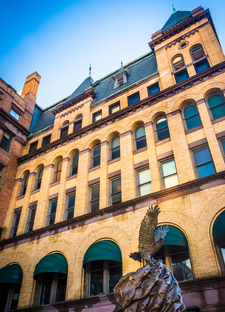 Looking up at a statue and old building in downtown York, Pennsylvania