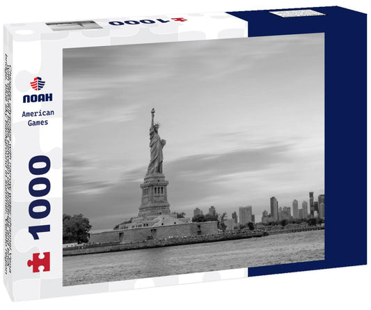 Noah Jigsaw Puzzle Chioggia cityscape with narrow water channel Vena with colorful boats between old buildings and brick bridge, blue sky background in summer, Veneto region, northern Italy in black white 1000 pieces