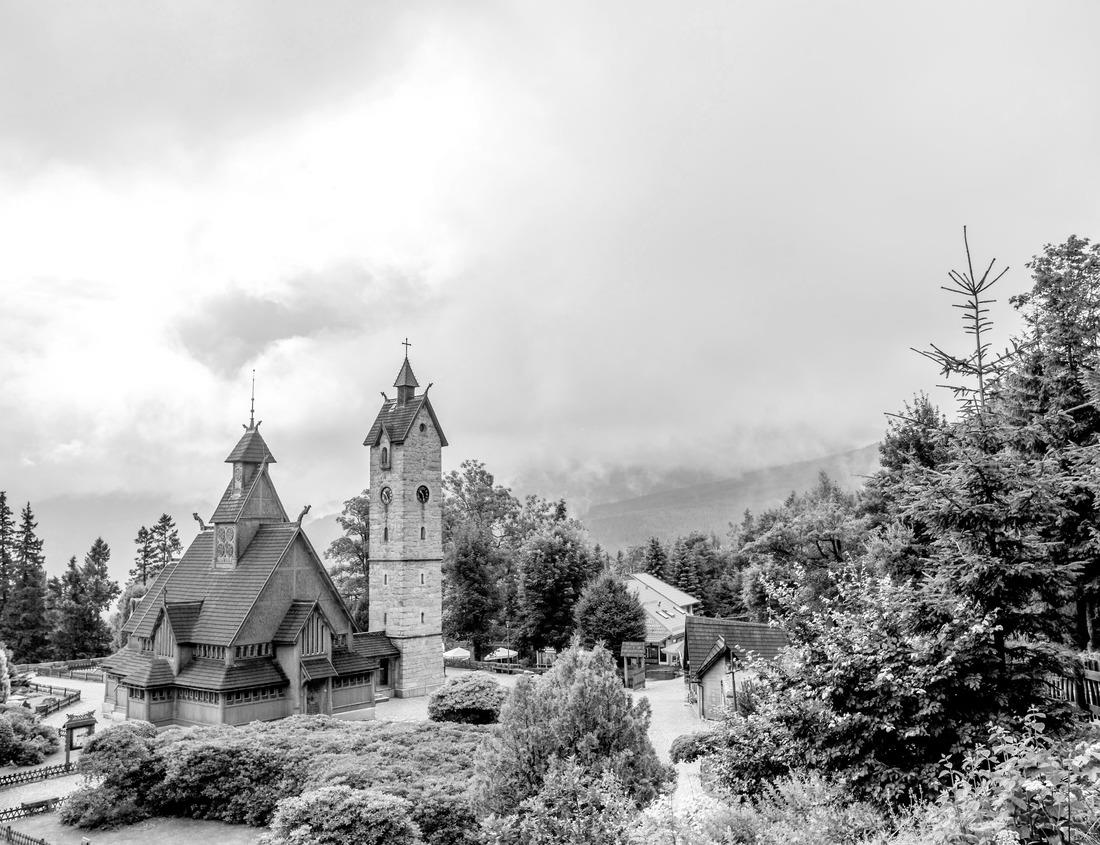 Noah Jigsaw Puzzle Morro Rock rising out of Morro Bay in San Luis Obispo County in California. A horseman rides past in black white 1000 pieces