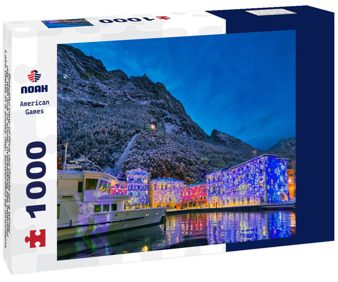 Noah Jigsaw Puzzle Beautiful view of Riva del Garda on a winter day with lots of snow, overlooking the beautiful Lake Garda in a snowy day, surrounded by mountains, Trentino Alto Adige region 1000 pieces