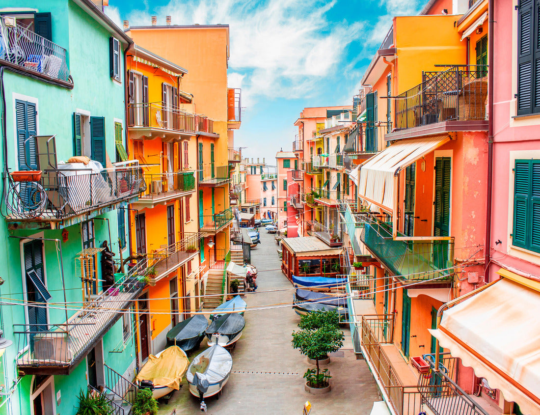 Noah Jigsaw Puzzle Manarola, Liguria Italy. Traditional typical Italian village in the Cinque Terre National Park, colorful multi-colored buildings houses, fishing boats on the road, blue cloudy sky 1000 pieces