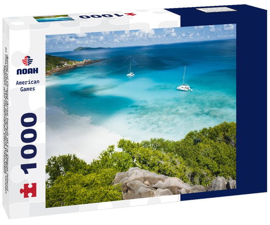 Noah Jigsaw Puzzle Aerial of Grand Anse beach at La Digue island in Seychelles. White sandy beach with blue ocean lagoon and catamaran yacht moored 1000 pieces